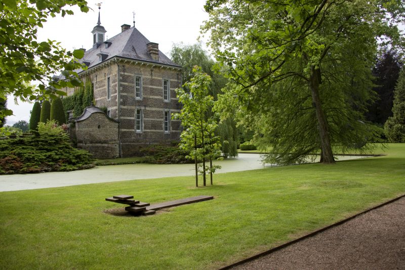 A modern art sculpture at the Kasteel Wijlre estate. The Carel Visser sculpture stands on the lawn that surrounds the mansion